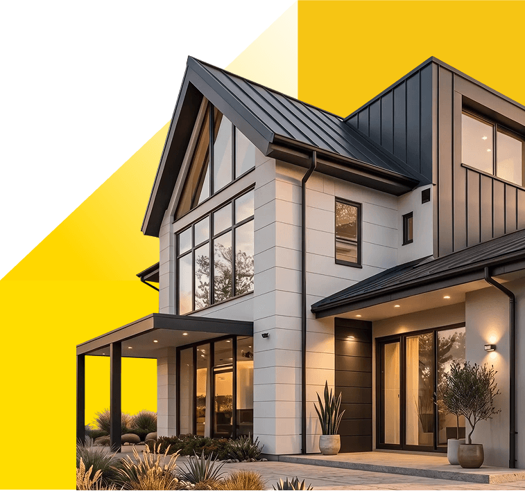 Modern farmhouse exterior lit at dusk