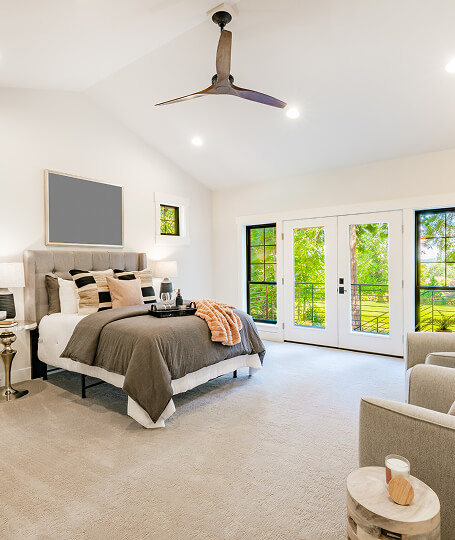 Bedroom carpet with french doors