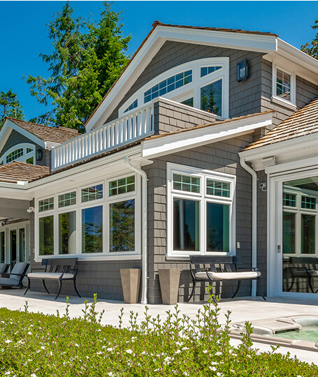 Craftsman exterior multi pane windows and balcony